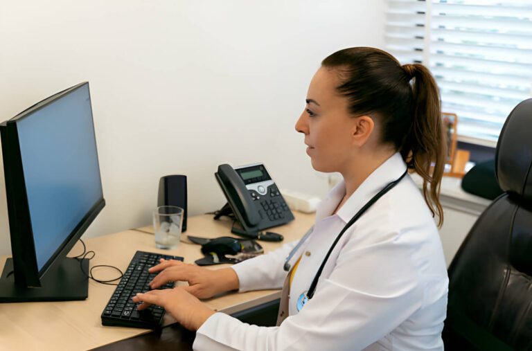 MBA in Healthcare Administration - Online Student Working on a Project